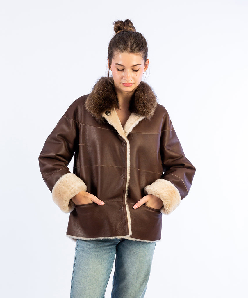 Abrigo doble faz piel a bandas contraste