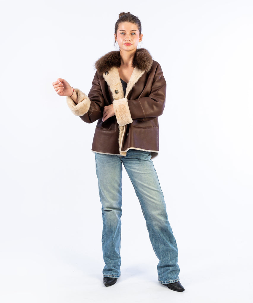 Abrigo doble faz piel a bandas contraste