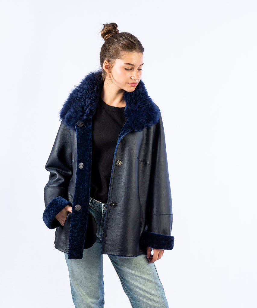 Abrigo doble faz reversible piel con pelo