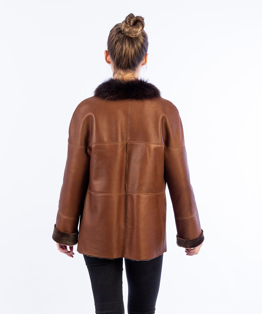Abrigo piel doble faz cuello contraste
