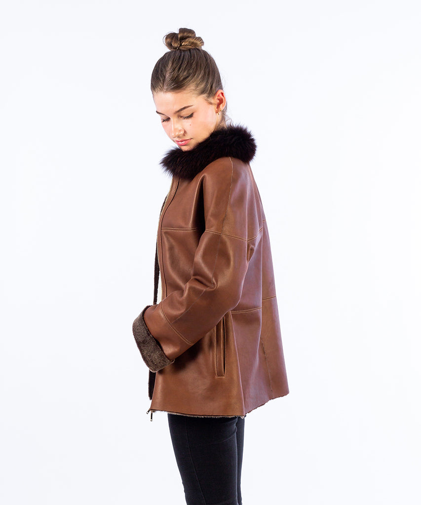 Abrigo piel doble faz cuello contraste