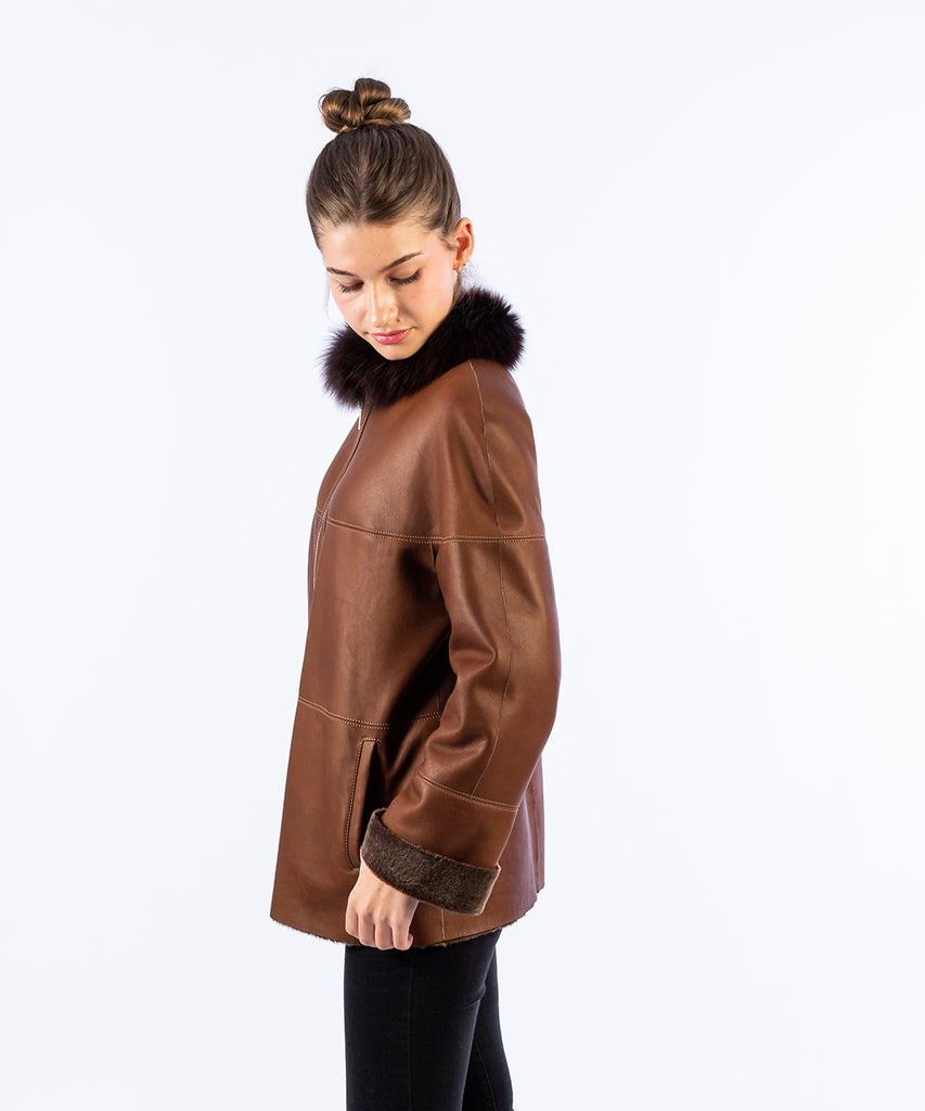 Abrigo piel doble faz cuello contraste