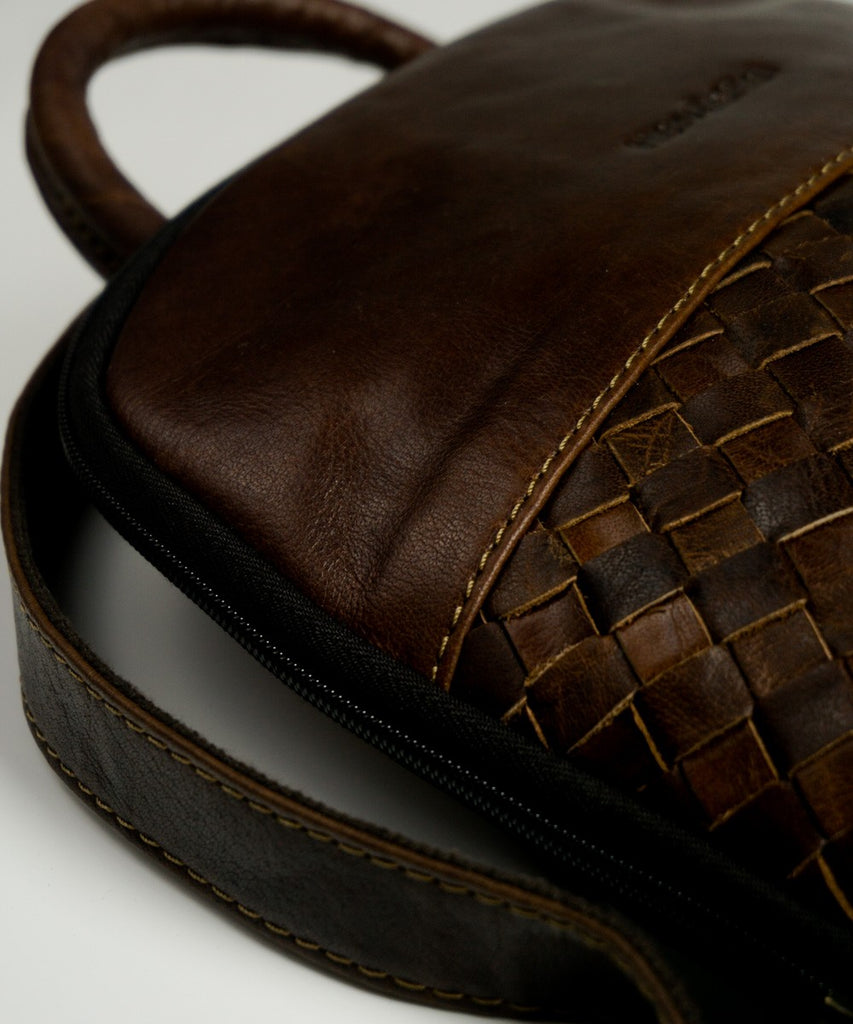 Mochila cuero detalle trenzado
